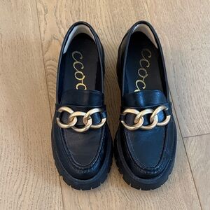 Black Lug Sole Loafers with Gold Chain Detail